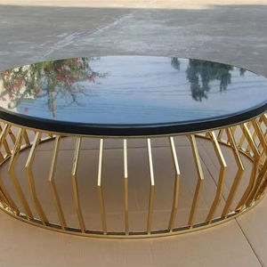 โต๊ะกาแฟทรงกลมสีทองและสีดำคอลเลกชันโต๊ะโลหะหินอ่อน - Product Image 1