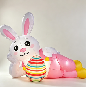 Lindo conejo de Pascua inflable acostado junto a un huevo colorido para jardín, patio, porche y decoración de temporada. - Product Image 2