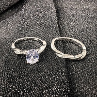 Bijoux fins à la mode plaqué rhodium rationaliser S925 argent ovale tricot torsion Moissanite anneaux de mariage ensemble pour Couple fiançailles