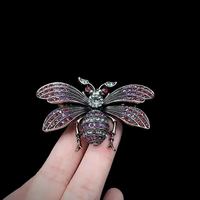 Broche vintage tendance avec nœud, micro-incrustée de zircon coloré, corsage en ruban, accessoires pour manteau et costume pour femme, broche pour vêtements