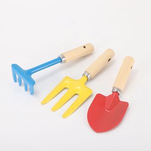 Children's Garden Tools Set 3 Pc Rake Fork Shovel Wooden Handle Outdoor Play Toys For Kids Ages 2 4 Years - Product Image 1