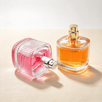 Flacon de parfum en verre transparent cylindrique vide portable de 30 ml et 100 ml avec bouchon sphérique coloré pour le transfert de parfum et le stockage de fragrances