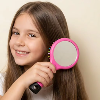 Brosse à cheveux démêlante à coussin d'air double face avec logo personnalisé, motif arc-en-ciel, forme S ondulée, avec miroir intégré pour le coiffage des filles