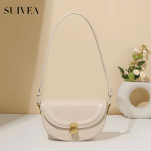 Bolso de mujer de moda francesa de nicho italiano bolso de sillín redondo cien veces hebilla de concha PUFlat crema blanco Mini bolso de hombro con textura - Product Image 4