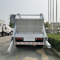 Camion benne basculante HOWO 4X2 300HP à bras articulé, diesel manuel, norme Euro 2, pour collecte de déchets, chargement de conteneurs et compactage de recyclage
