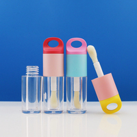 Stock de grande tête de brosse de couleur d'injection mignonne de 1.5ml, tube de brillant à lèvres, tube vide avec logo personnalisé et boîte