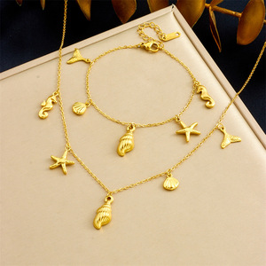 Ocean Themed Gold Plated Necklace And Bracelet Set With Starfish Seahorse Conch Shell Charms Stainless Steel Jewelry Gift - Product Image 1