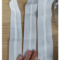 Accessoire vestimentaire : Bande élastique tricotée en polyester avec cordon de serrage intégré pour ceinture