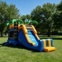 Château gonflable commercial sur le thème de l'océan avec toboggan et palmiers pour la location de fêtes d'enfants