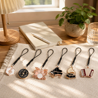 Proveedor Mayorista de Dijes Esmaltados de Instrumentos Musicales, Colgante Metálico con Cordón Trenzado Negro, Llavero Musical, Accesorios para Bolsos y Teléfonos