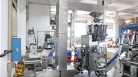Ligne de production de remplissage de granulés entièrement automatique à 10 têtes Machine de remplissage de graines de melon Amandes Noix