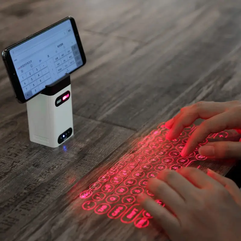 Keyboard proyeksi Laser Virtual nirkabel Bluetooth Mini, dengan fungsi catu daya ponsel braket ponsel standar lain