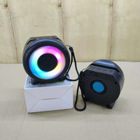 Nouvelle Enceinte Portable Extérieure Mini Sans Fil Étanche en Plastique avec Subwoofer DC, Lumière LED RGB 7 Couleurs et Horloge, Mode Privé Transfrontalier