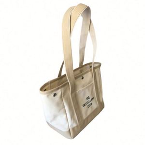 Bolso tote de lona blanca resistente para mujer, impermeable, reutilizable, con asa de cinta, para uso diario, tamaño mediano - Product Image 2