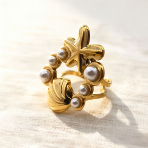 Ocean themed open face stainless steel <b>ring</b> for women featuring a conch shell and starfish design a unique and exaggerated style - Product Image 1