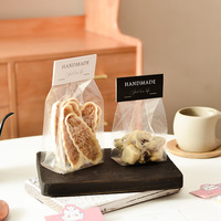 Sac d'emballage individuel transparent avec étiquette papier seau, bonbons, canneberges, biscuits, goodies, boulangerie, dessert
