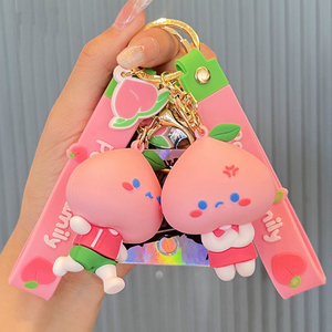 Lindo 3D Rosa melocotón familia llavero moda dibujos animados PVC cuentagotas muñeca bolsa colgante coche llavero venta al por mayor melocotón llavero - Product Image 2