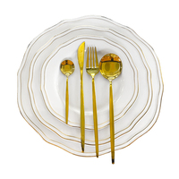 Design moderne de luxe Ensemble d'assiettes et de bols en porcelaine à bordure dorée Fourniture d'usine en grès écologique pour la maison ou l'hôtel