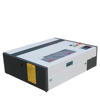 Petites machines de gravure laser de bureau 50w 4040 Mini machine de découpe laser en métal et en plexiglas pour décoration de gâteau
