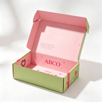 Boîte d'expédition personnalisée en carton ondulé recyclé avec fermeture auto-adhésive et bande de déchirement, avec revêtement UV pour vêtements et chaussures
