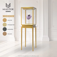 Vitrine de présentation haut de gamme MASTER en verre avec cadre métallique doré et éclairage LED, verrouillable, pour bijoux, pour magasin de détail, OEM