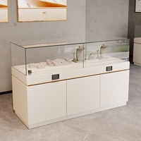 Vitrine d'exposition pour bijoux et objets de musée avec éclairage LED, design sans dos, verre transparent, personnalisable, gris