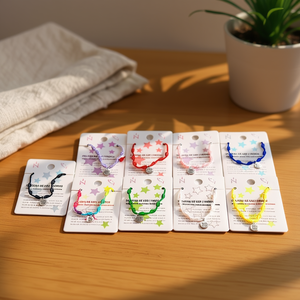 Braccialetto Angelina in Acciaio Inox con Nodo a Sette Stelle, Set di 12 Bracciali alla Moda Unisex, Gioielli Regalo Prodotti in Cina - Product Image 2