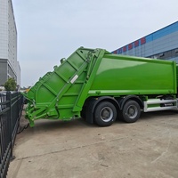 Camion Compacteur de Déchets Électrique d'Occasion Howo 6x4 de Bonne Qualité avec Système Hydraulique 20cbm 21cbm 22cbm Prix