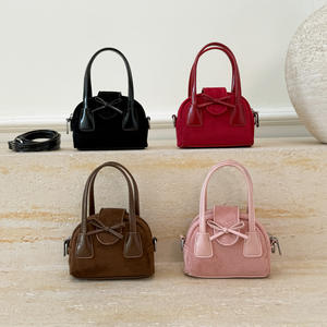 Yeni stil çocuk çantası kızların Retro çanta High-end yay Mini çapraz vücut çanta - Product Image 1