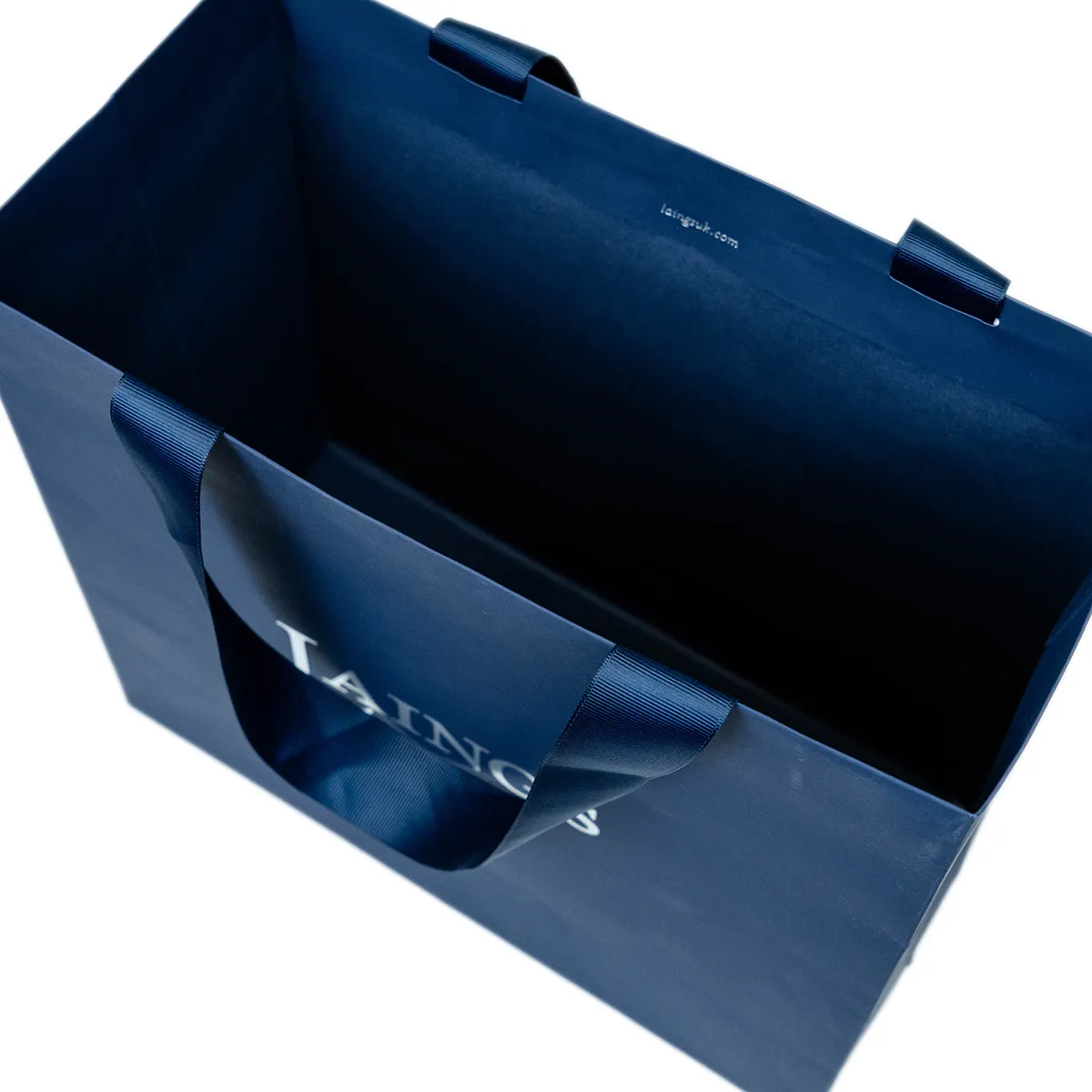 リサイクルカスタムプロモーションリボンギフト衣類包装ブルーペーパーショッピングバッグあなた自身のロゴハンドル卸売