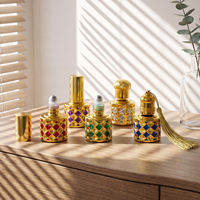 Flacon de parfum en verre de 10 ml avec motif quadrillé doré, pierres à facettes, applicateur à bille, vaporisateur rechargeable pour huile de parfum, idéal pour les voyages et les cadeaux