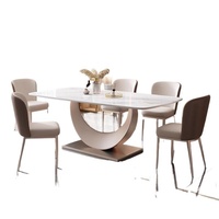 Table à manger extensible en acier inoxydable de style italien ensemble de chaises Design moderne 6 places légères de luxe prêtes pour les mariages de petite taille