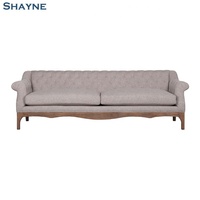 202603 High Point Aussteller OEM für bekannte Marken Amerikanischer Stil Stoff Antikweiß Holz Wohnzimmer Sofa-Set