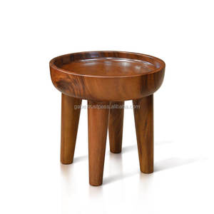 Modern <b>round</b> <b>side</b> <b>table</b> featuring a unique concave design, securely displaying items with elegance; handcrafted from a single - Product Image 4