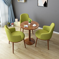 Ensemble de table à manger minimaliste moderne de bonne qualité avec 4 chaises, plateau en pierre frittée, design en panneaux de bois pour hôtel, hôpital, appartement