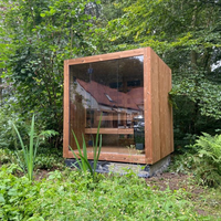 Cabine de sauna extérieure minimaliste carrée, lignes épurées, bois massif, sauna moderne pour jardin