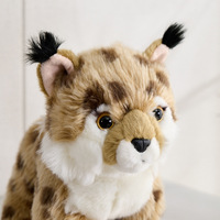 Vente en gros Peluche lynx jaune debout par simulation Animal en peluche Cadeau d'anniversaire pour enfants Poupée en peluche léopard réaliste