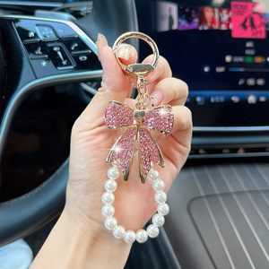 Porte-clés de voiture en forme de nœud perlé, orné de diamants, avec papillon en cristal et nœud papillon en métal en alliage de zinc - Product Image 3