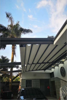 Grande pergola motorisée rétractable coupe-vent pour jardin, avec structure en alliage d'aluminium et voile rétractable pour extérieur
