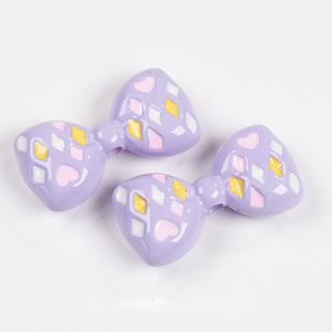 <span class=keywords><strong>Perles</strong></span> acryliques émaillées 35x15mm en forme d'éléments de poker et de nœuds de clown pour la fabrication de chaînes de téléphone et de bracelets (vente en gros) - Product Image 6