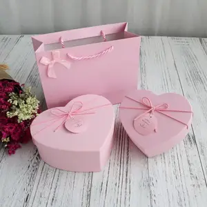 بيع بالجملة صناديق هدايا فاخرة وردية بتصميم مخصص على شكل قلب ونمط رومانسي