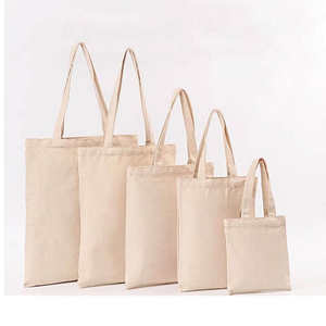 Environmentally friendly and reusable designer <b>fabric</b> canvas cotton shopping <b>bag</b> with custom logo printed on it - Product Image 4