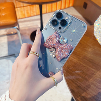 Étui de téléphone portable DIY de luxe avec nœud papillon en cristal brillant pour iPhone 16 15 14 13 12 Samsung