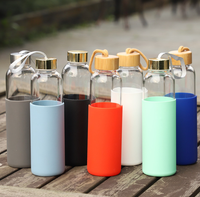 Verrerie d'extérieur Bouteille d'eau en verre borosilicaté transparent portable avec manchon en silicone