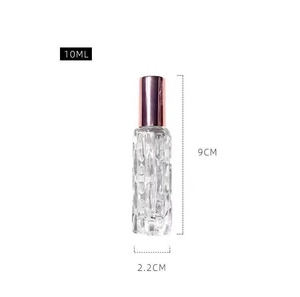 Sunshine Luxury Venta caliente 10ml Botella de perfume de vidrio con superficie almenada dorada con bomba de spray - Product Image 3