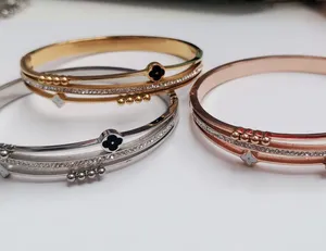 BMZ 2024 Novas joias da moda com laço de 3 cores pulseiras de punho em aço titânio para homens e mulheres