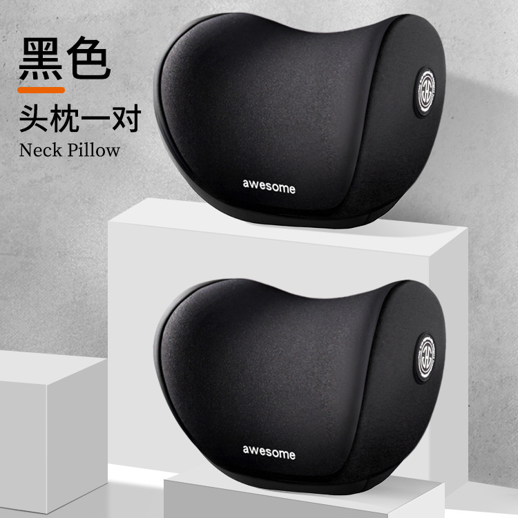 A pair of black headrests