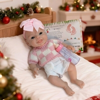 Poupées Bébé Reborn en Silicone de 10 Pouces, Jouet Doux Lavable, Fille Réaliste au Toucher Doux, Kit d'Alimentation pour Bébé Réaliste, Éducatif