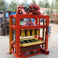 Nouveau modèle de machine manuelle de fabrication de blocs en ciment pour murs creux machine à fabriquer des blocs en stock maxi au Gabon en Ouganda