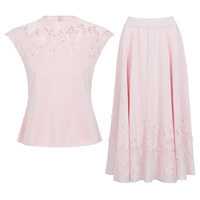 Ensemble deux pièces pour femmes en tricot avec décoration de paillettes en cristal haut de gamme, haut sans manches assorti à une jupe mi-longue, élégant pour le quotidien et le bureau